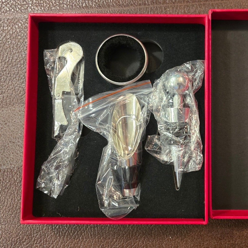 Boyd Gaming 4 Piece Wine Accessory Set Stainless Steel Corkscrew Stopper Red Box